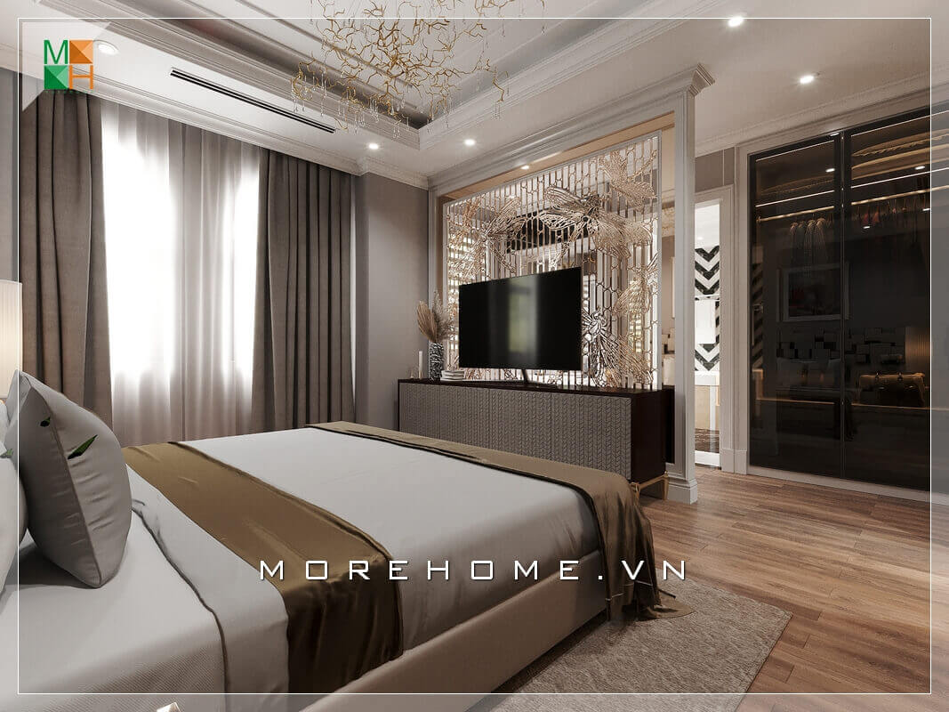 Vẻ đẹp sang trọng của mẫu phòng ngủ thể hiện ở việc lựa chọn những cái đèn sắc vàng, đèn chùm treo tường đầy sức lôi cuốn và tinh tế. Thiết kế phòng ngủ chung cư
