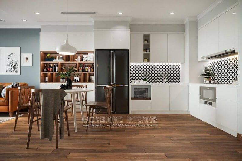 Khu vực bếp được thiết kế nhỏ gọn liên kết trực tiếp với phòng khách