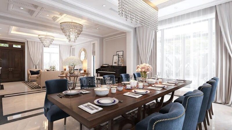 Bố trí phòng ăn liền phòng khách đẹp, sang trọng ấn tượng với sắc xanh nổi bật từ bộ bàn ghế cùng lối thiết kế nội thất tân cổ điển quý phái.