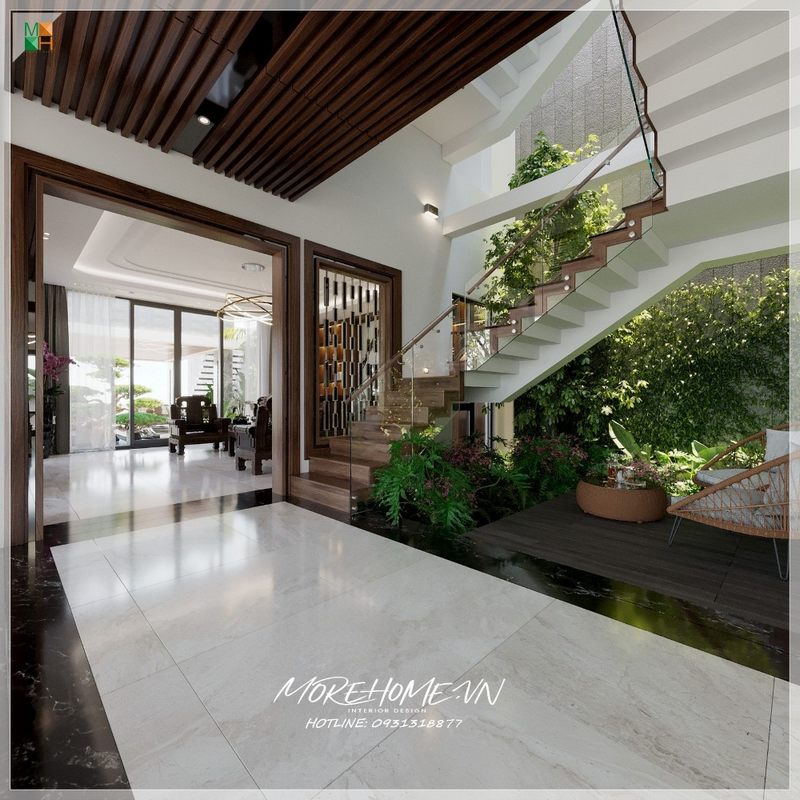 Cầu thang gỗ kính hiện đại tạo nên một không gian rộng rãi và thoáng đãng.